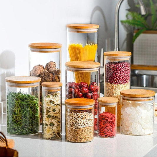 Glass storage jars with wooden lids